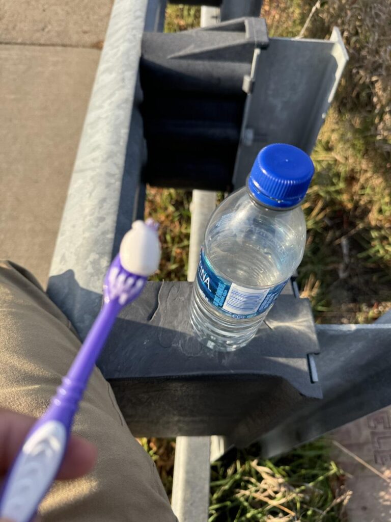 Vittorio brushes his teeth with a toothbrush and toothpaste he picked up at Walmart mid-journey.